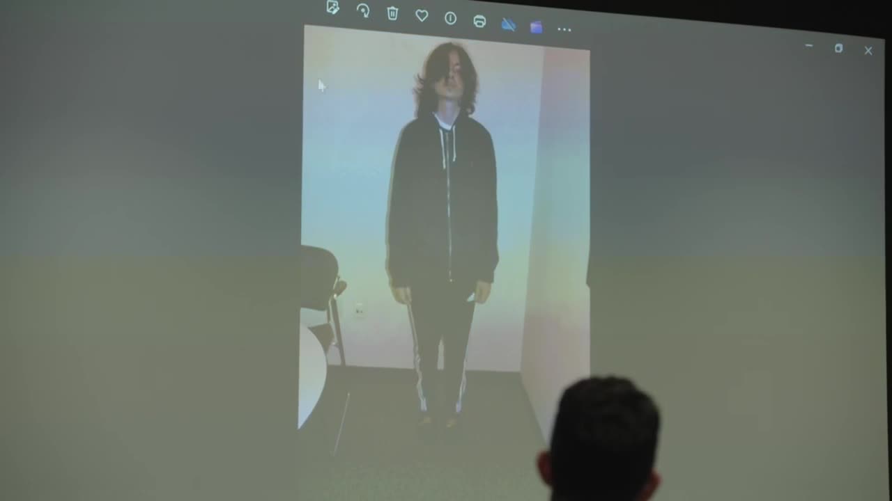Carlos Dominguez booking photo shown, detective notes blood stains during Davis stabbings trial