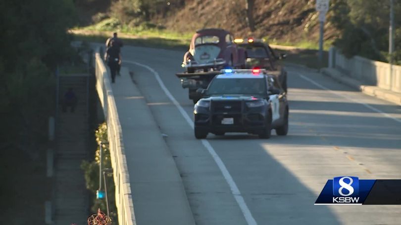 WATCH: Trooper leaps off 30-foot bridge to avoid crash
