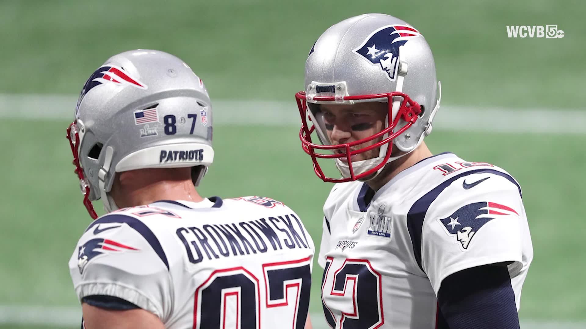 New England Patriots quarterback Tom Brady looks at the board