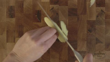 Finger, Thumb, Nail, Paper, Paper product, Hardwood, Craft, Creative arts, Stationery, Gesture, 