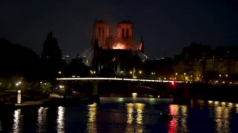 preview for Firefighters Work to Put Out the Fire at Notre-Dame