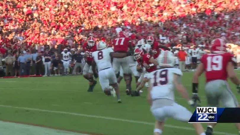 Beck throws and runs for TDs to launch new era as No. 1 Georgia rolls past  UT-Martin 48-7