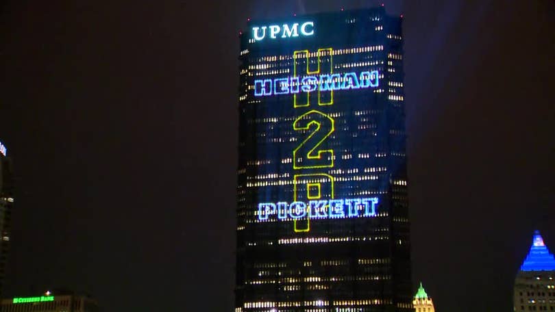 Pittsburgh Steelers Players And High Rising Buildings With Lights