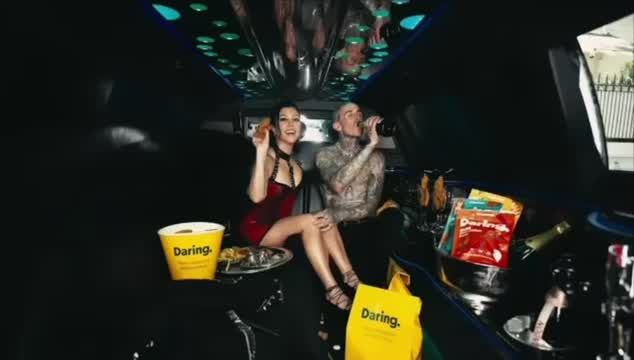 preview for Kourtney Kardashian Eats Vegan Chicken in Lingerie with Travis Barker for Daring Campaign