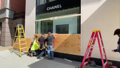 Chanel shop on Newbury Street boarded up