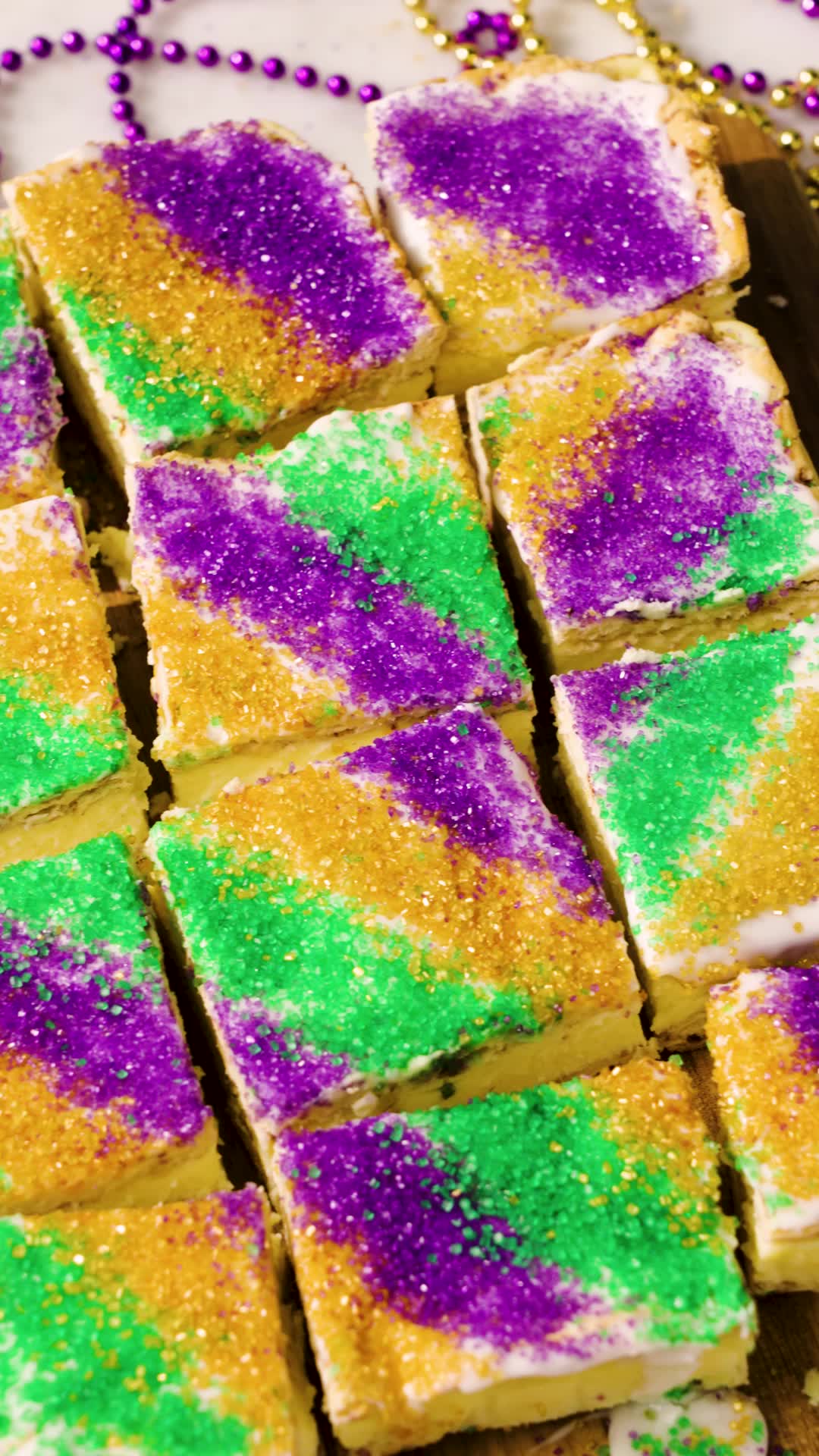 preview for King Cake Cheesecake Bars Are The Mardi Gras Mash-Up You Need