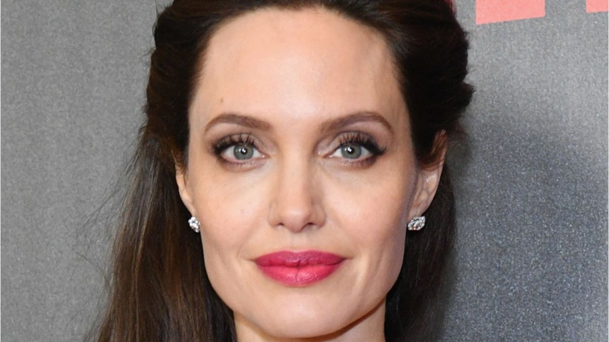 preview for Angelina Jolie juggles film and family at Toronto premiere