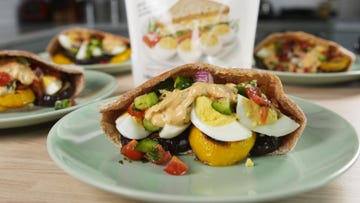 grilled eggplant and zucchini sabich pita made with eggland's best eggs