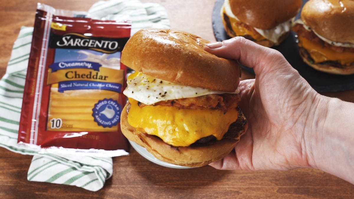 preview for Creamy Chilaquiles Burgers Get Melty Cheese, Saucy Chips, AND a Fried Egg