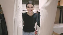 Kendall Jenner Lounges on a Bed in a Sheer White Tank and No Bra