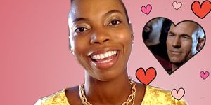 sasheer zamata smiles into a camera there is a heart with captain picard inside