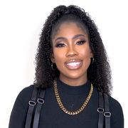 sevyn streeter smiles into the camera