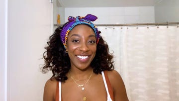 ego nwodim smiles in her bathroom