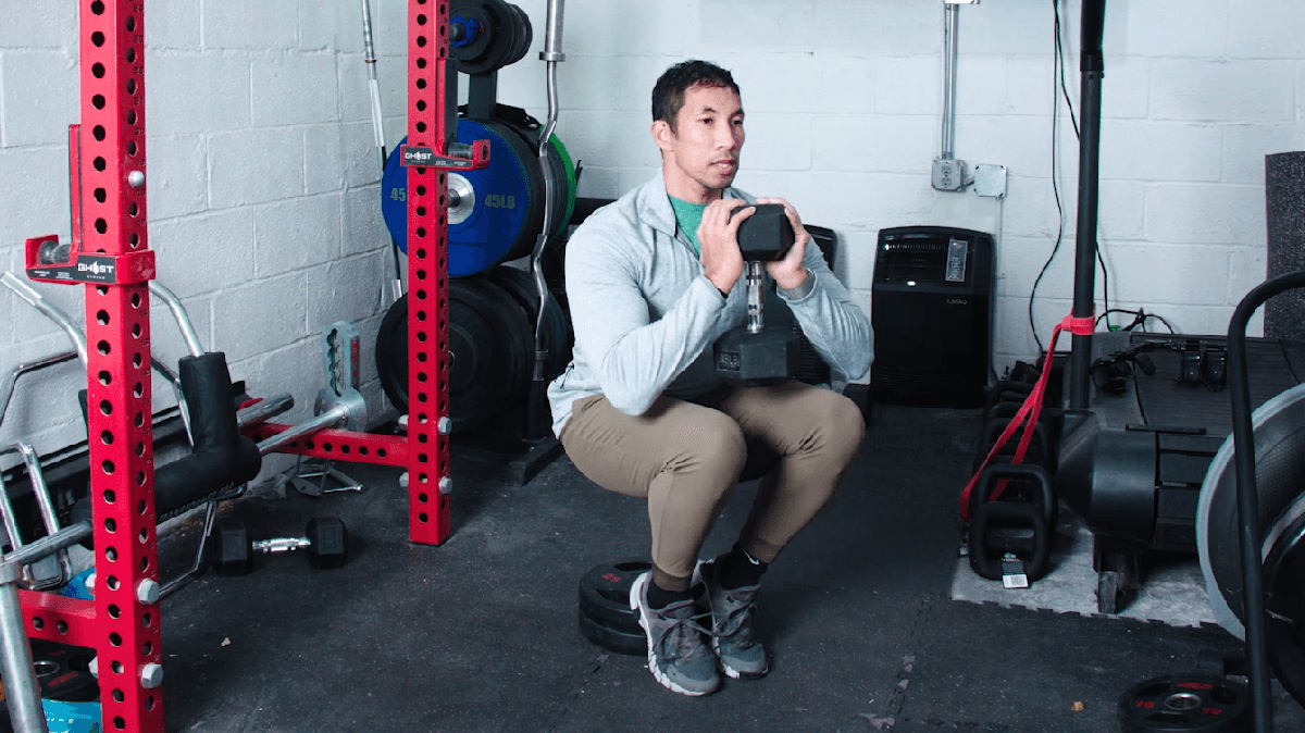 preview for Heel-Elevated Goblet Squats Isolate and Strengthen the Quads | Men’s Health Muscle