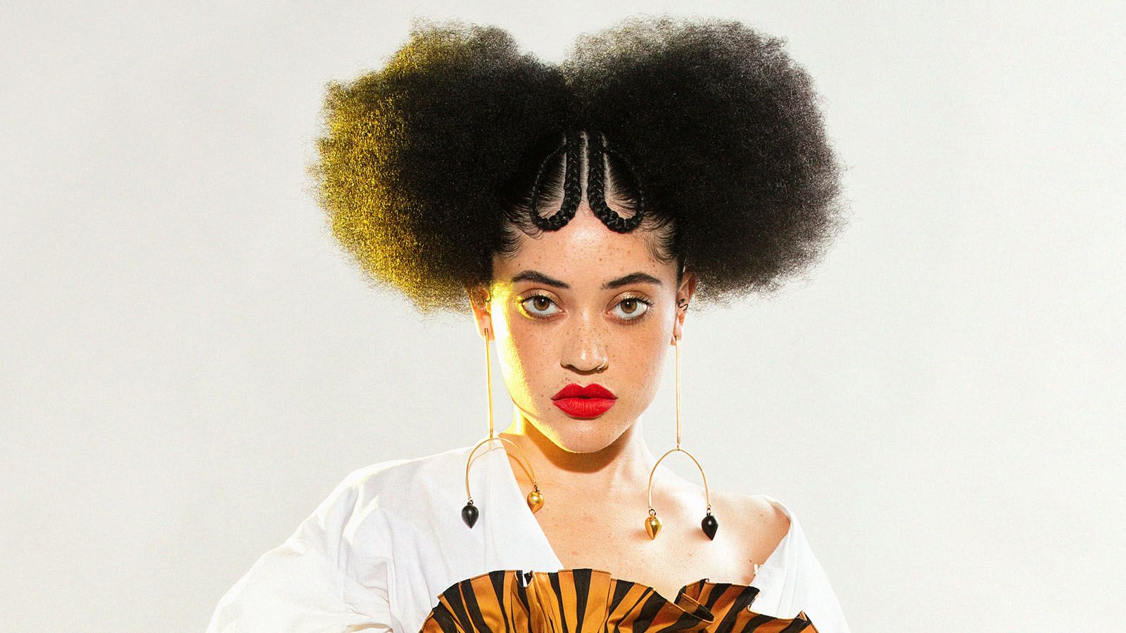 Afro Puff trendy haircuts for Black women  Afroculturenet