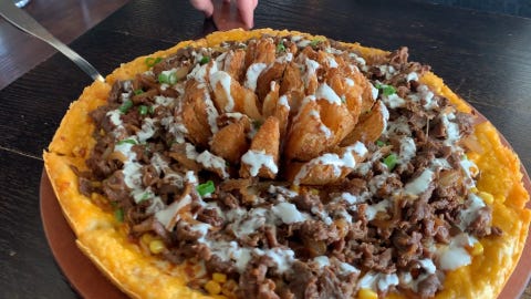 Koreatown Pizza Co. Makes Pizzas With Blooming Onions On Top