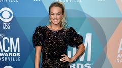 Carrie Underwood Shocks Fans in Tiny Denim Shorts and Rhinestone Boots