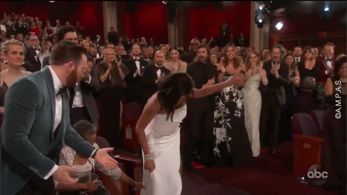 preview for Chris Evans Helping Regina King To The Stage To Collect Her First Ever Oscar Award Is A Superhero In Real Life