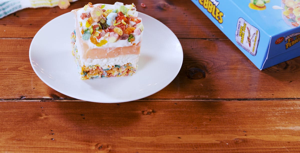 Video player poster image preview for This Marshmallow Fruity Pebbles Dessert Lasagna Is Layered With Cheesecake