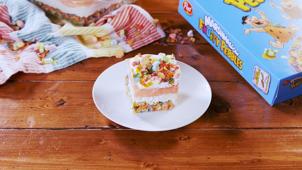 preview for This Marshmallow Fruity Pebbles Dessert Lasagna Is Layered With Cheesecake