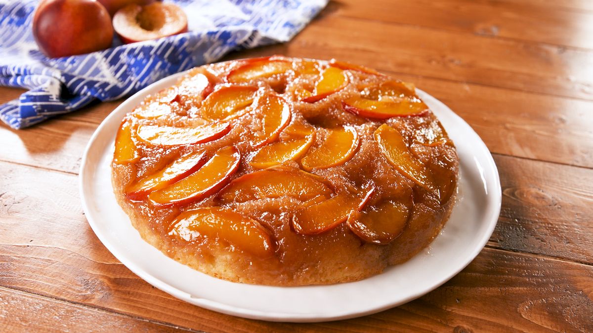 preview for This Summer Peach Upside-Down Cake Has A Boozy Caramel Glaze
