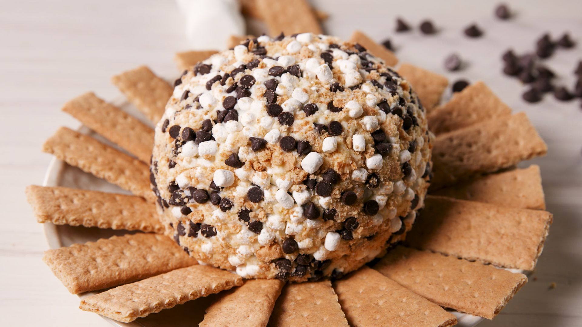 [Image: delish-smores-cheese-ball-still001-1528820351.jpg]