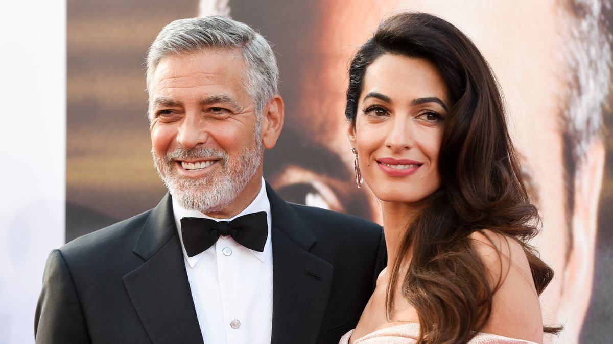 preview for A Look Back at George and Amal Clooney’s Epic Love Story