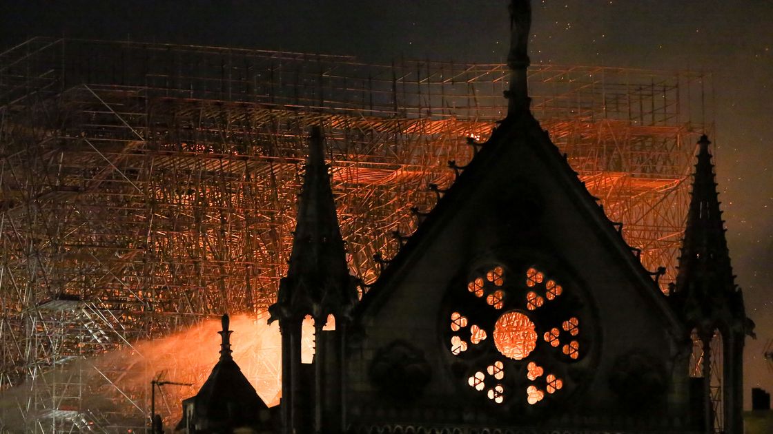 preview for Parisians Sing Hymns as the Watch Notre-Dame Burn