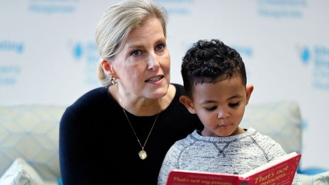 preview for Countess Sophie Reads a Book with a Child at Shooting Star House