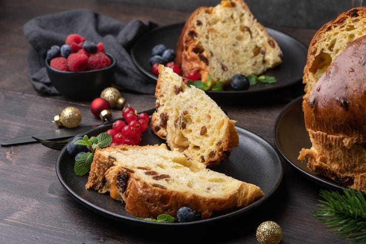 traditional italian christmas cake panettone with festive decorations