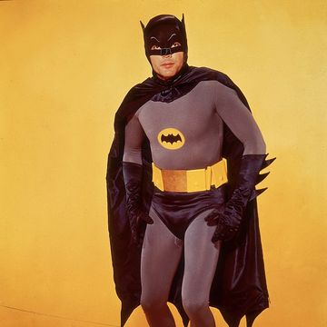 american actor adam west poses in costume as batman