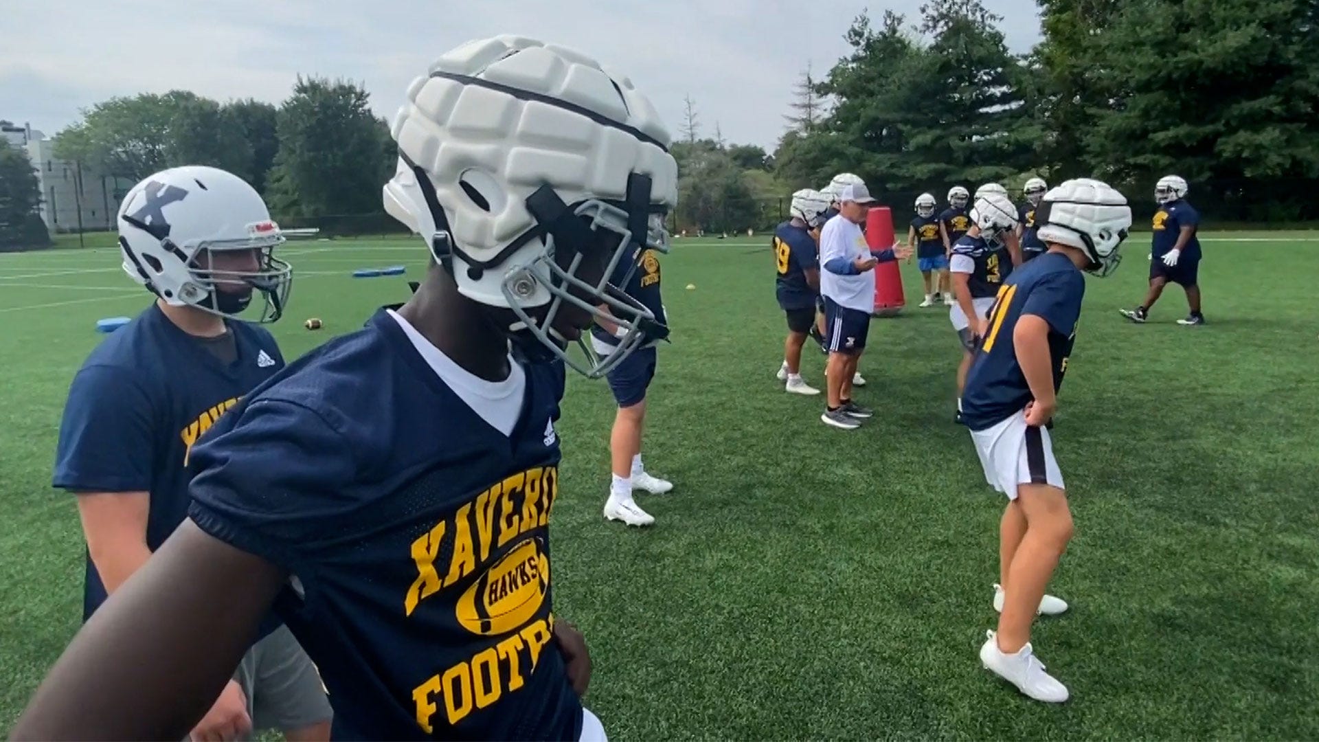 Colleges add Guardian football protective helmet cap - Sports