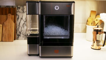 Kitchen appliance, Home appliance, Small appliance, Microwave oven, Room, Heat, Wood-burning stove, Oven, 
