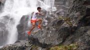 Champion ultrarunner Kilian Jornet scales a mountain as part of his "Summits of My Life" project.