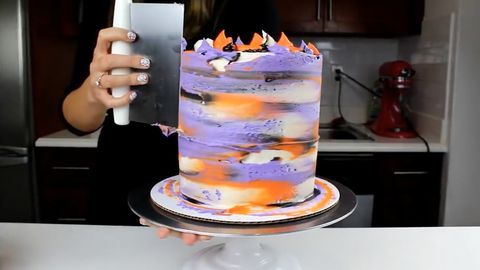 preview for You’ve Got to See the Mesmerizing Way This Halloween Cake is Frosted