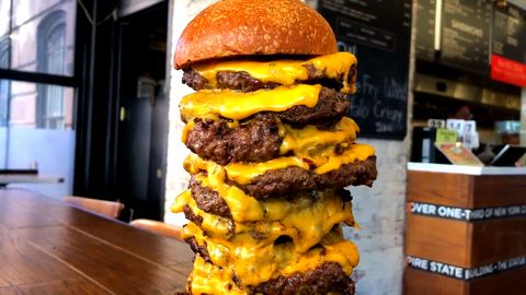 preview for This Burger Has 30 Layers Of Beef And Cheese