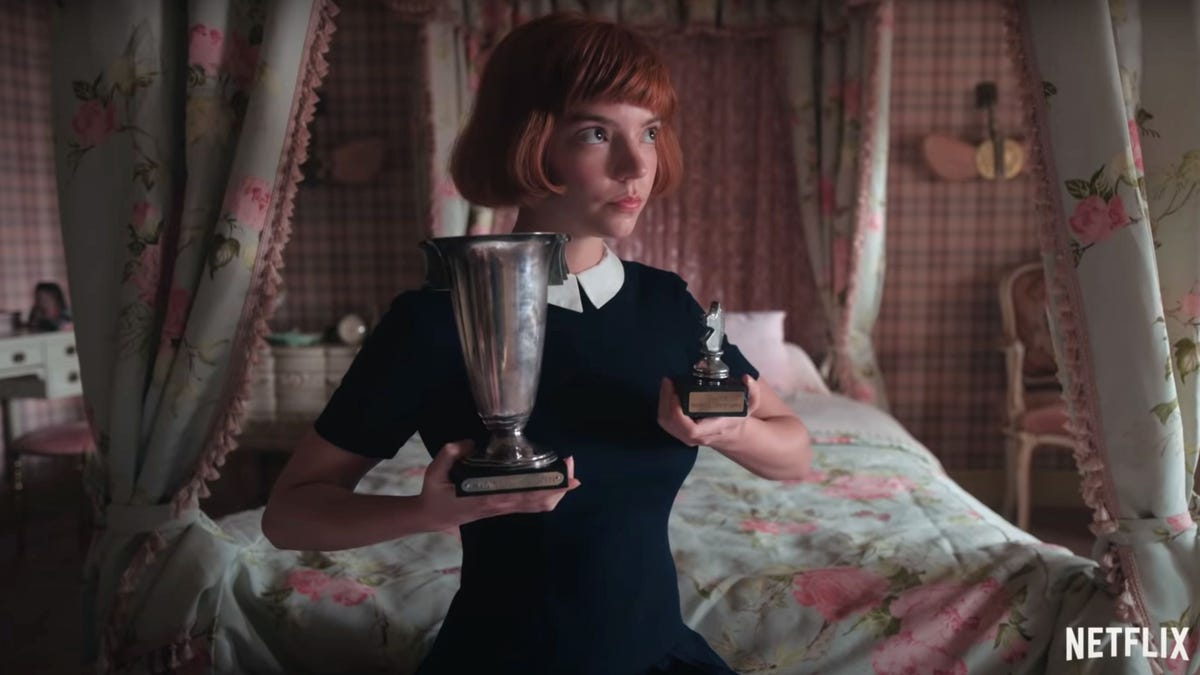 Beth posing with her trophies