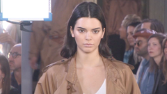 Kendall Jenner Wears Sheer Shirt, Mom Jeans + Nike Sneakers in Miami –  Footwear News