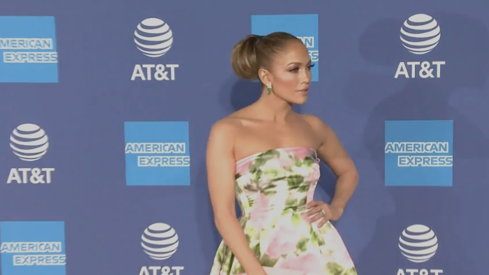 preview for Jennifer Lopez wearing Richard Quinn at the Palm Springs Film Festival 2020