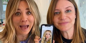 kaley cuoco holds a phone up to the camera