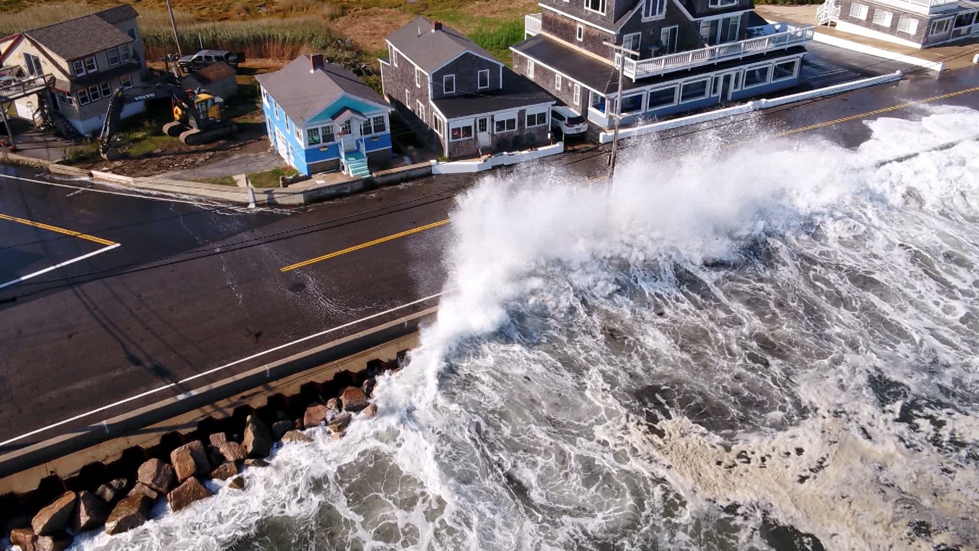 Big waves from Hurricane Teddy crash over Wells seawall