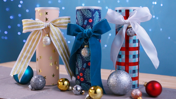 manualidad latas convertidas en cajas de regalo de navidad