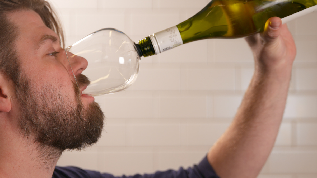 preview for This Couple's Crazy Wine Glass, The Guzzle Buddy. Has Gone From Gag Gift To Viral Hit!
