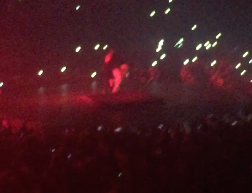 preview for Travis Scott falls on stage at Drake concert