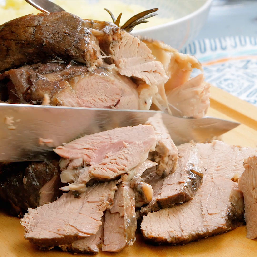 roasted lamb leg on board