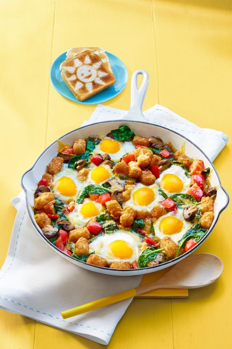breakfast ideas for kids egg and tater bake in skillet on yellow table