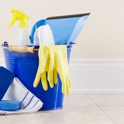 best cleaning tips bucket with gloves, sponges, towels, dustpan, and other spring cleaning supplies