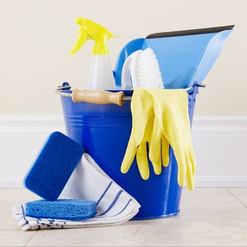 best cleaning tips bucket with gloves, sponges, towels, dustpan, and other spring cleaning supplies