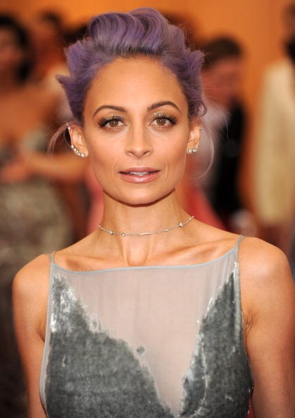 image <p><span class="redactor-invisible-space">Nicole was raised in California by music legend Lionel Richie and his then-wife Brenda. Nicole's biological parents are often said to be friends of the couple and a one-time bandmate of Lionel, but it's never been confirmed. She was legally adopted at age nine, and had another music icon play a role in her childhood: her godfather was Michael Jackson. </span></p>
