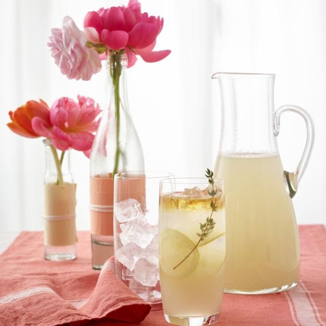best mocktails pitcher and cup of sparkling thyme lemonade